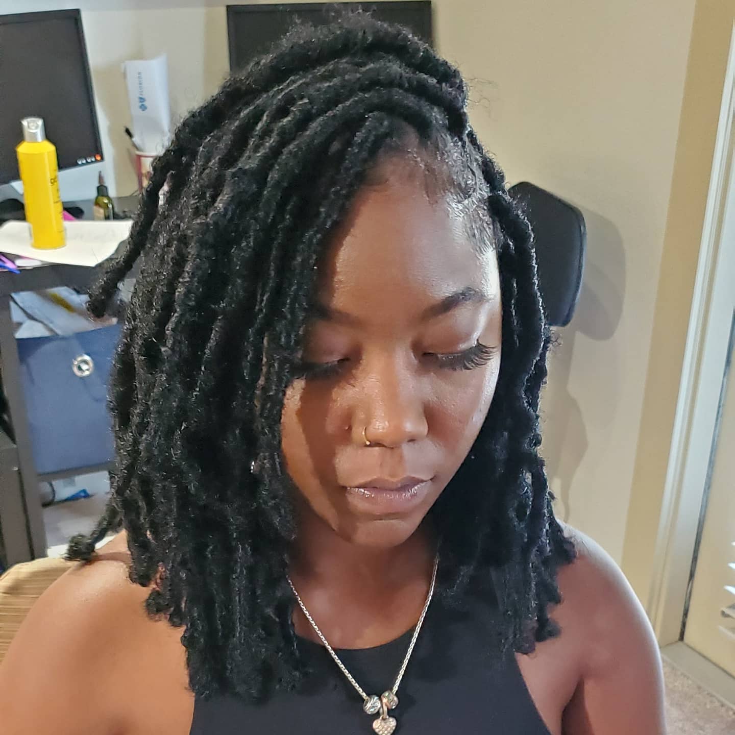Butterfly loc - Clenched Beauty